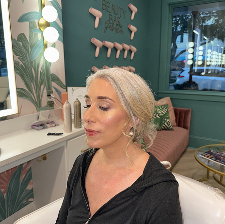 Bride getting makeup done